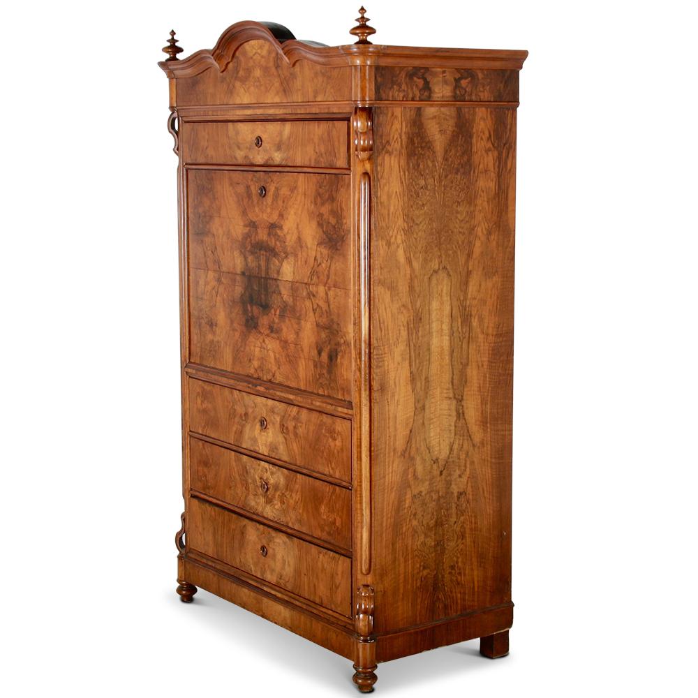 A late-19th century German drop-front secretary in burl walnut, the desk opening to an interior fitted with nine smaller drawers and a mirror back, the case with three lower drawers beneath the writing surface, and an upper drawer above.
A