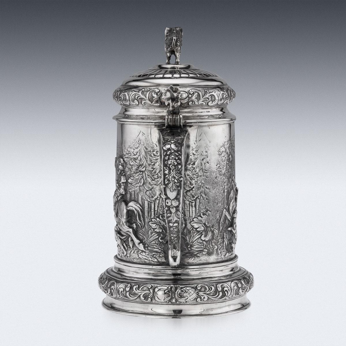 19th Century German (Hanau) silver large lidded tankard, in the style of the early 16th century example, beautifully chased and embossed with a very detailed and crowded hunting scenes.
Hallmarked with German marks 800 (800+ standard), Hanau,