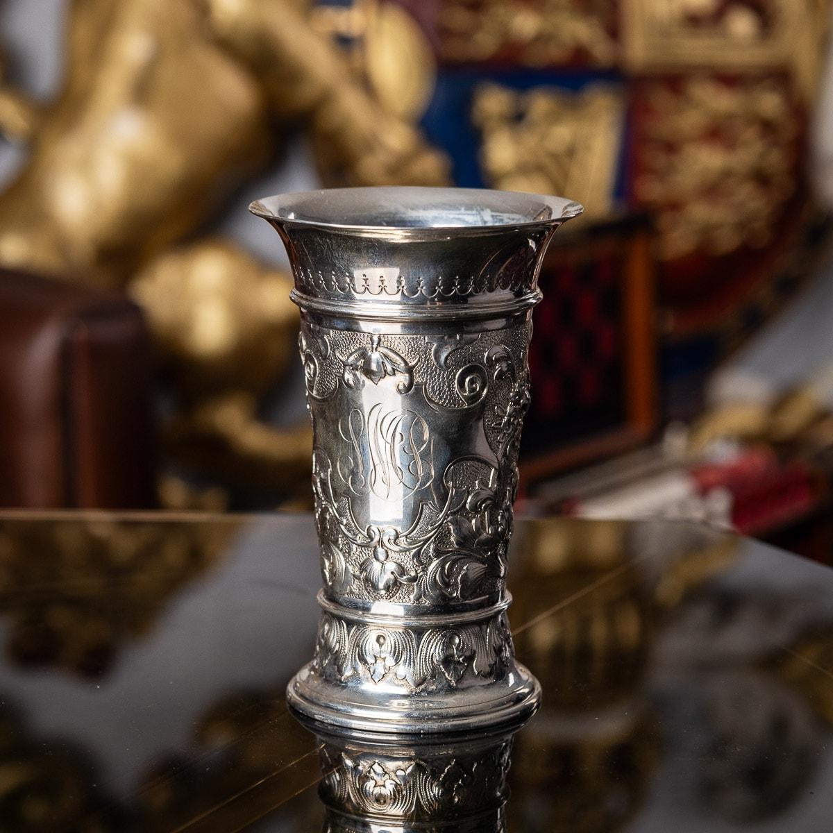 Antique late 19th Century German solid silver wine goblet, featuring stunning workmanship, made in the Renaissance style, it stands on a circular domed foot chased with a foliate decoration and a cherub surrounded by scrolling foliage on a matted