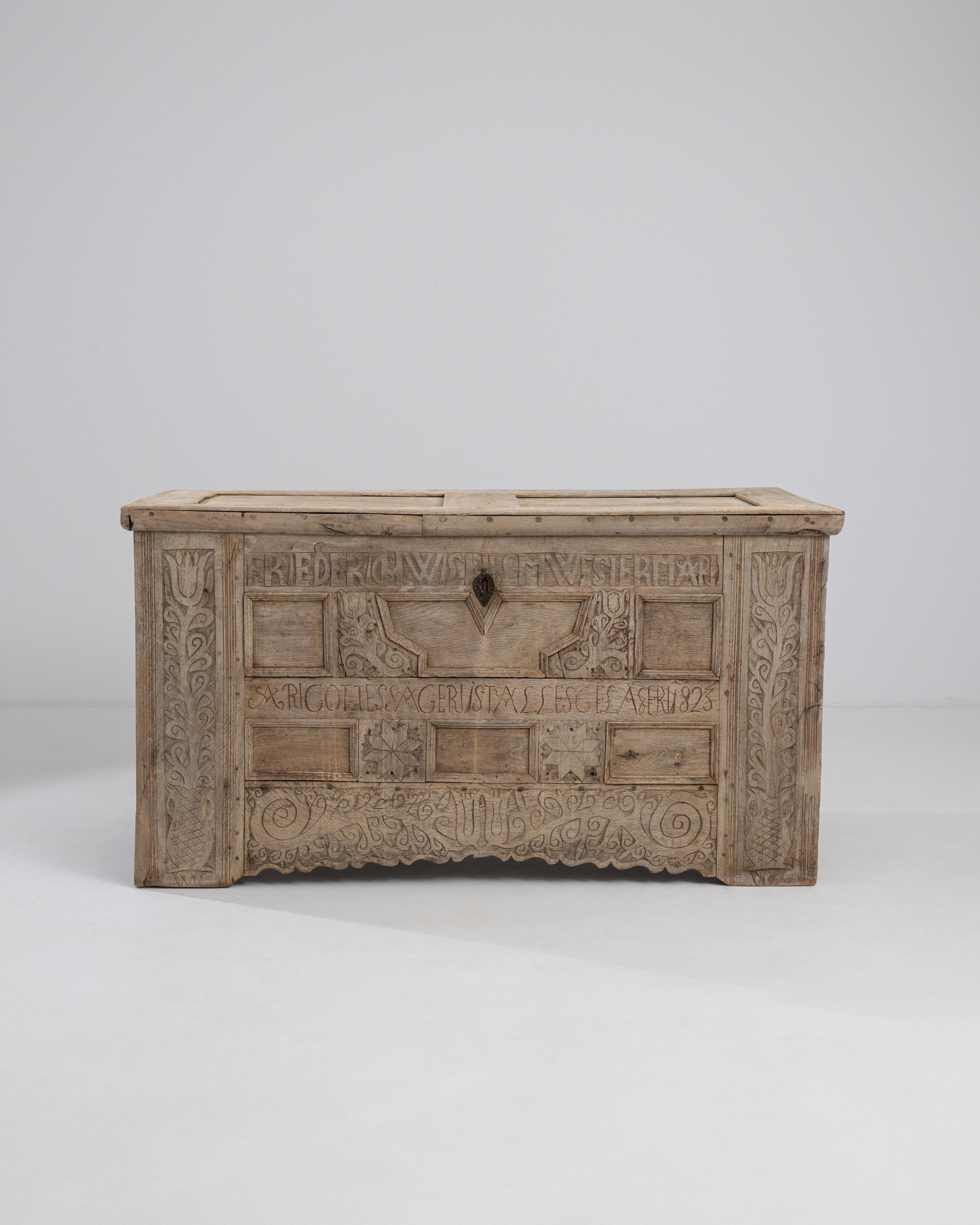 A wooden trunk from Germany, circa 1823. This enormous trunk is scrupulously carved from head to toe with a horror vacuii sensibility. Carved with the former owner’s name, the lettering as well as star and floral motifs emit both a majesty and a