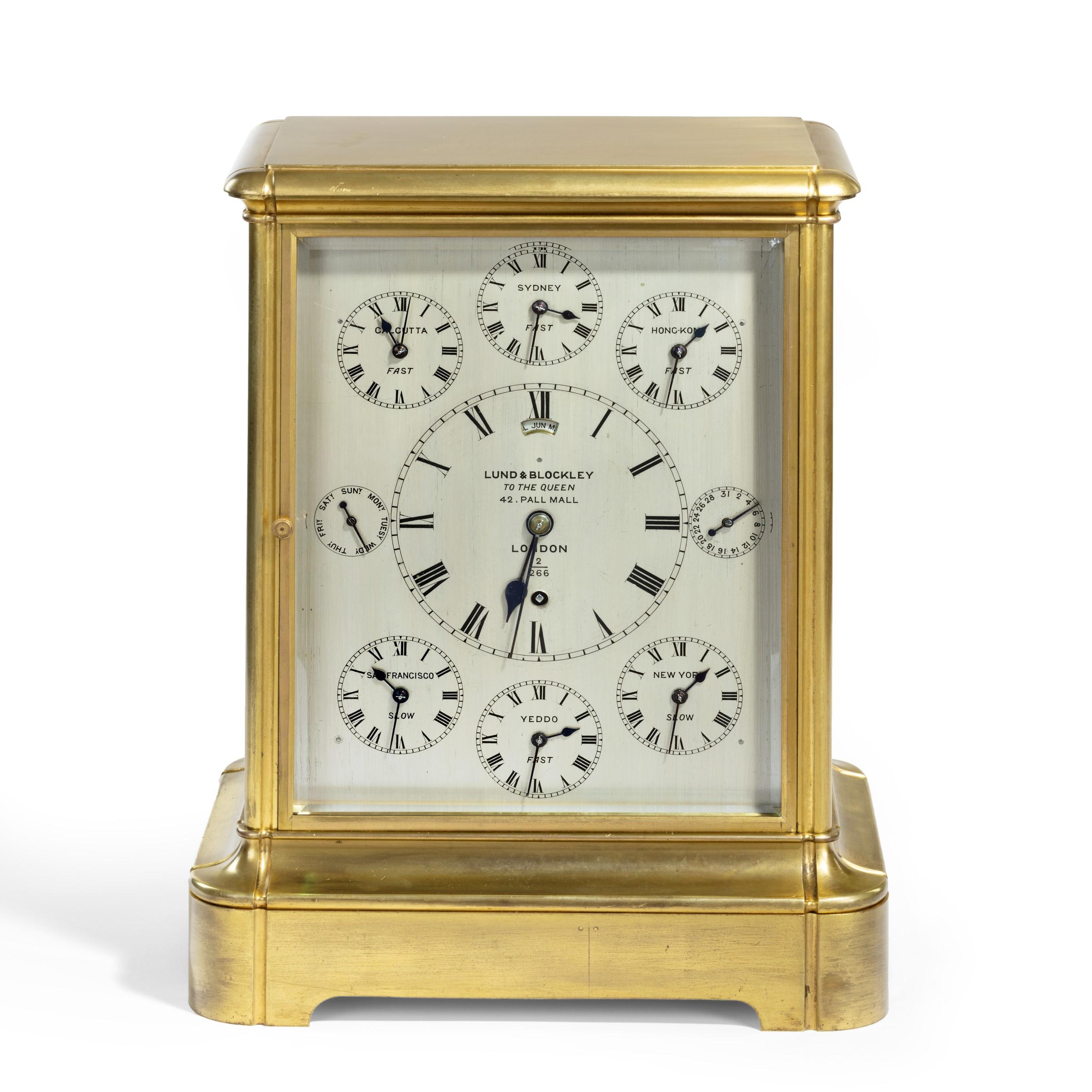 A fine and rare giant English four glass table regulator with World Time dial and Perpetual Calendar by Lund & Blockley, 
the rectangular silvered dial with world time indication on the main dial for London with six subsidiary dials for Calcutta
