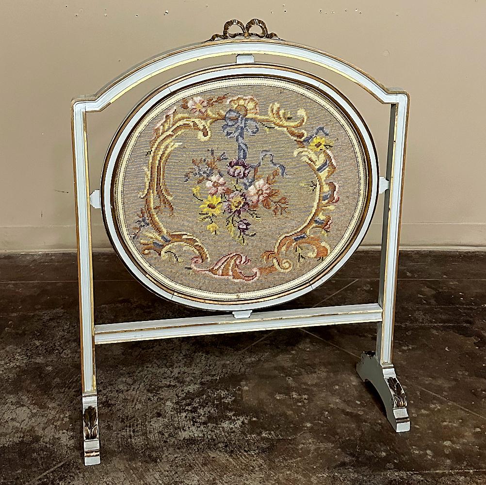 19th Century Gilded & Painted French Louis XVI Firescreen with Tapestry was designed to provide an attractive cover for the fireplace during the summer months, as well as provide a shield from radiant heat that was perhaps too intense for those
