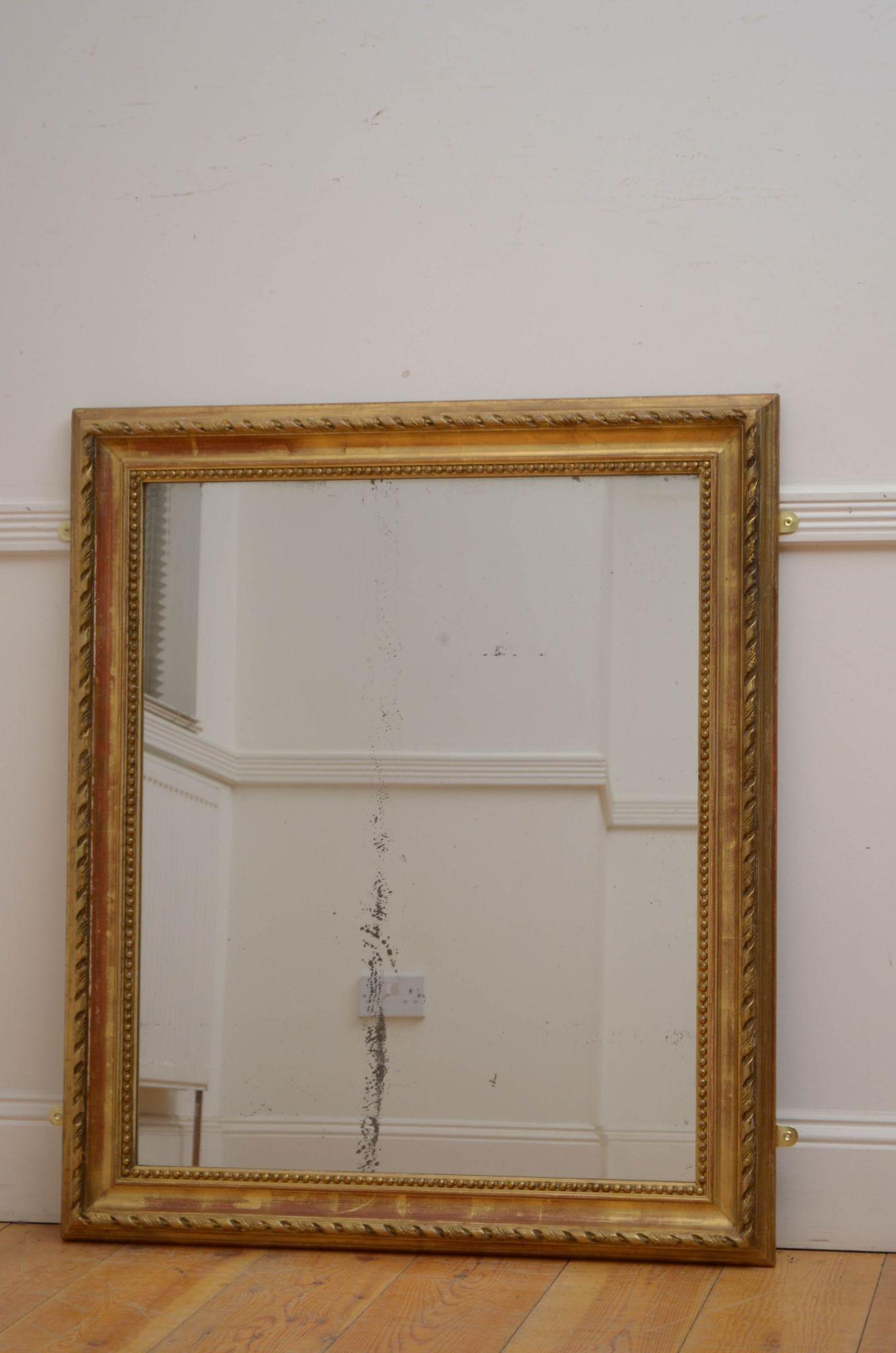 Sn5459 Attractive 19th century mirror which can be positioned horizontally or vertically, having original glass with some foxing in moulded and gilded frame with beaded inner edge and finely carved outer edge, all in home ready condition. c1870
H41