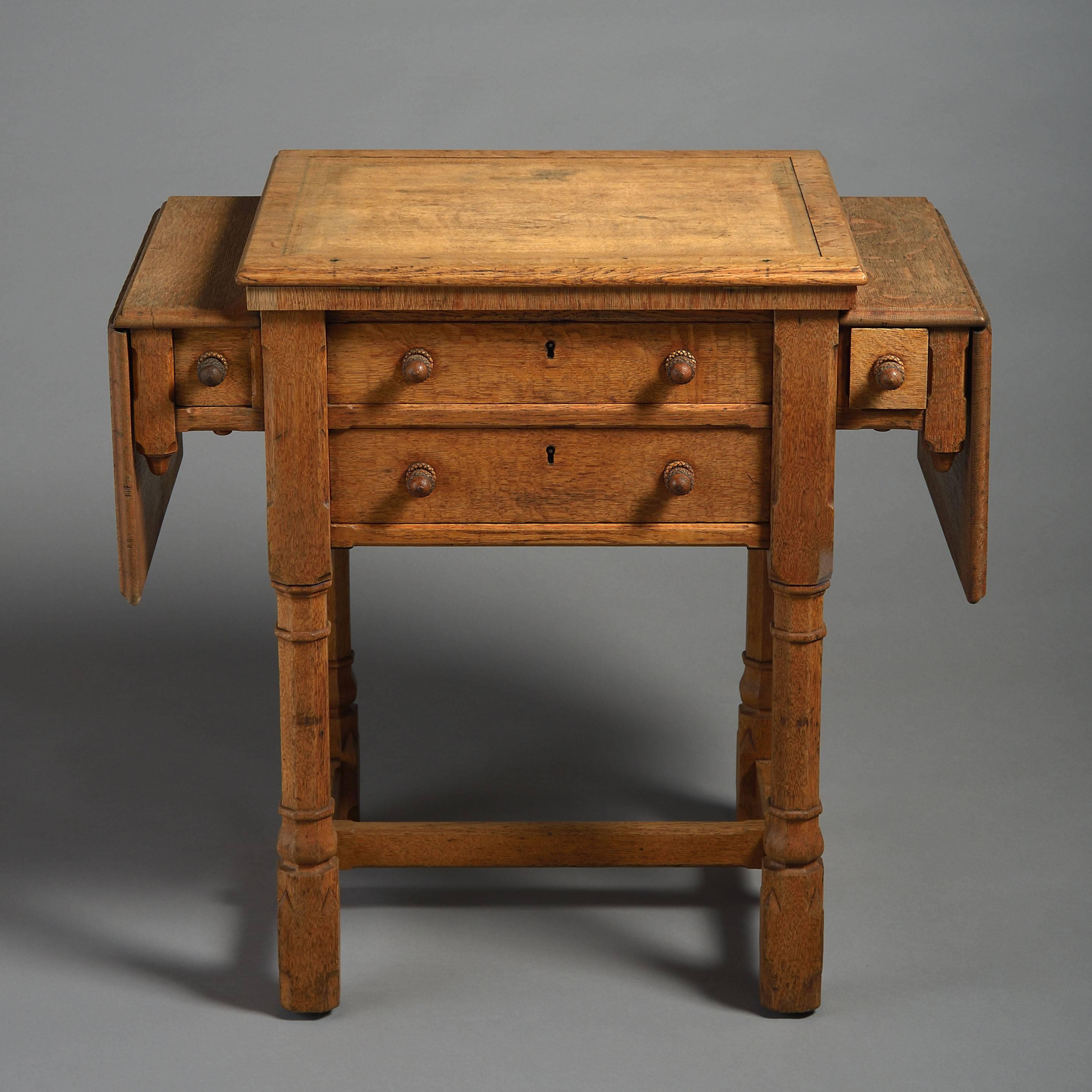 A late 19th century metamorphic oak work table, having a ratcheted tilt top, drop leaves, two long and two short drawers with carved aoorn handles, raised on chamfered legs conjoined with an H-form stretcher. 

Stamped Gillows.