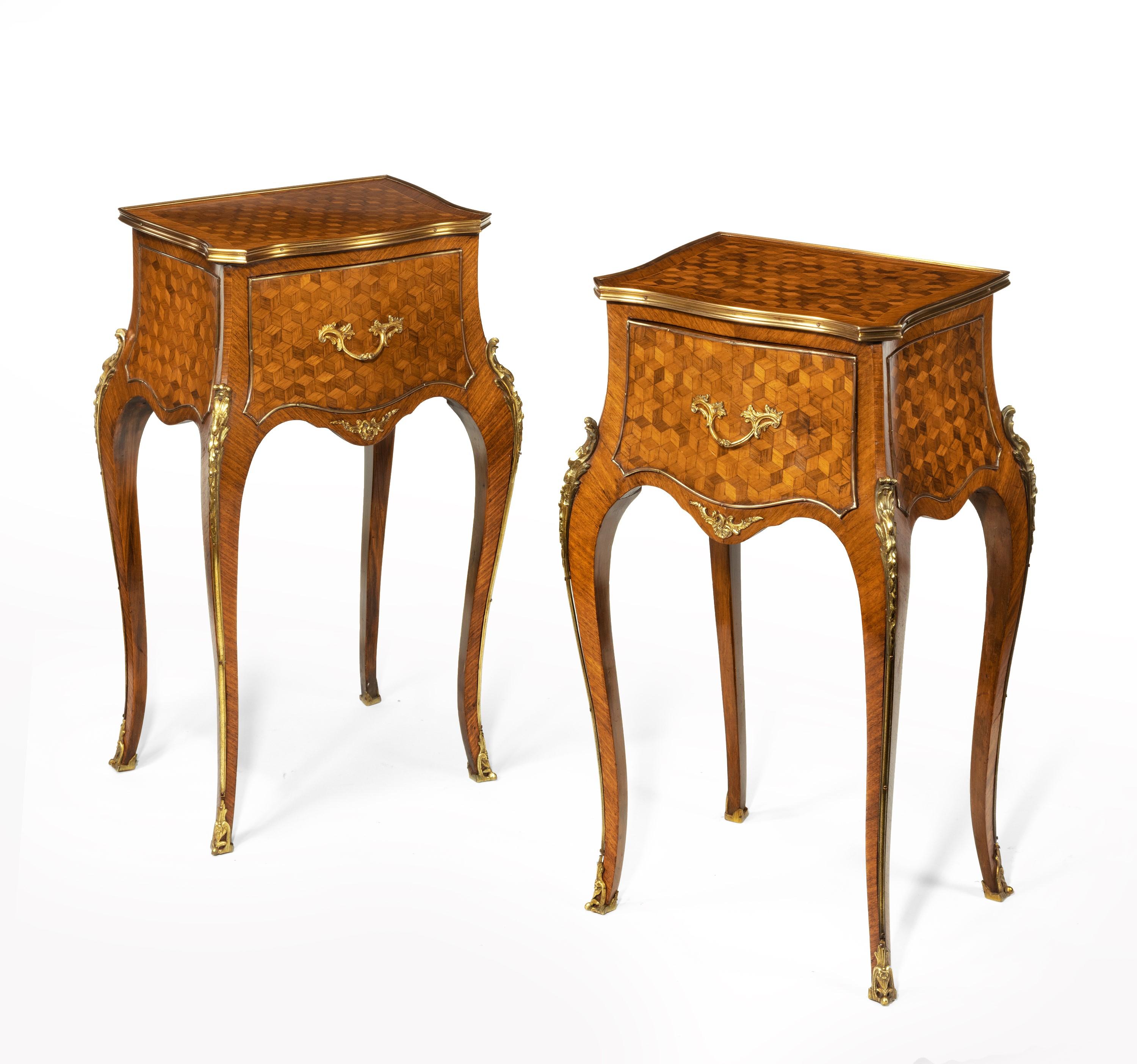 A fine pair of late 19th century Kingwood parquetry serpentine bedside cabinets / side tables / nightstands attributed to Gillows.

English, circa 1870.

Having serpentine shaped tops to the front and sides, each with inset kingwood parquetry