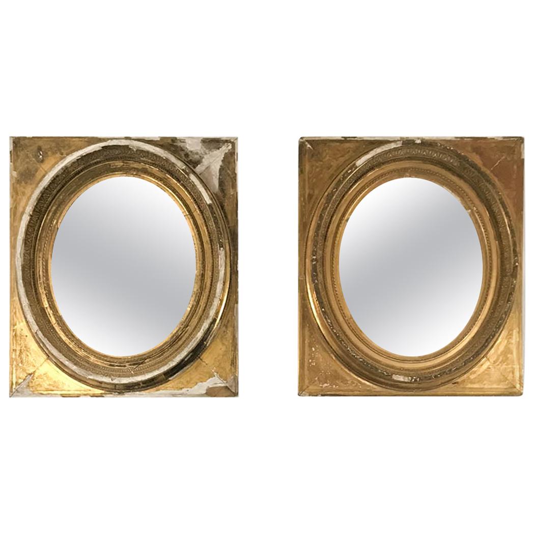 19th Century Gilt and Gesso Pair of French Oval Mirrors