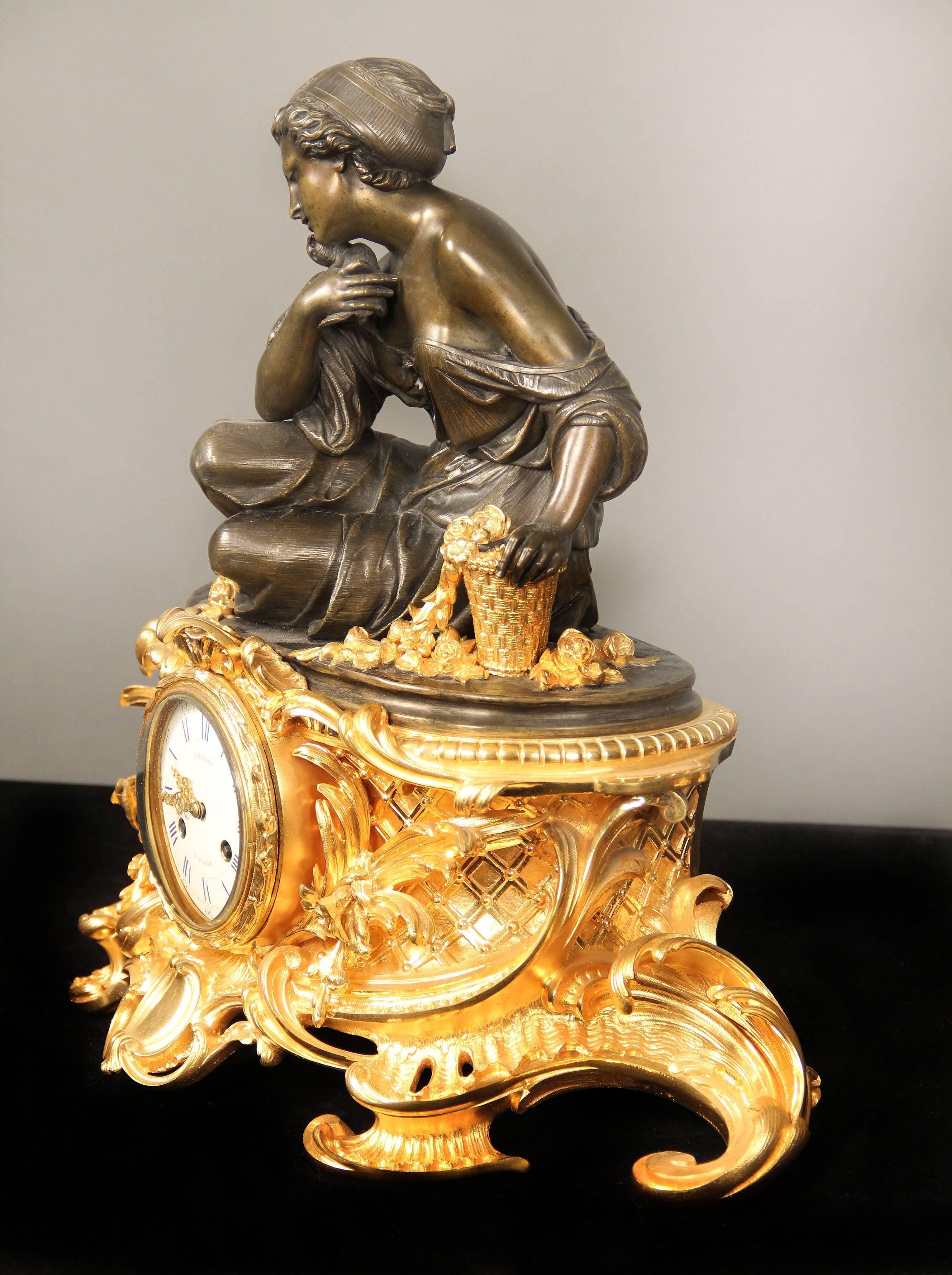 Belle Époque Ensemble d'horloges trois pièces en bronze doré et patiné du 19ème siècle de Victor Pierret en vente