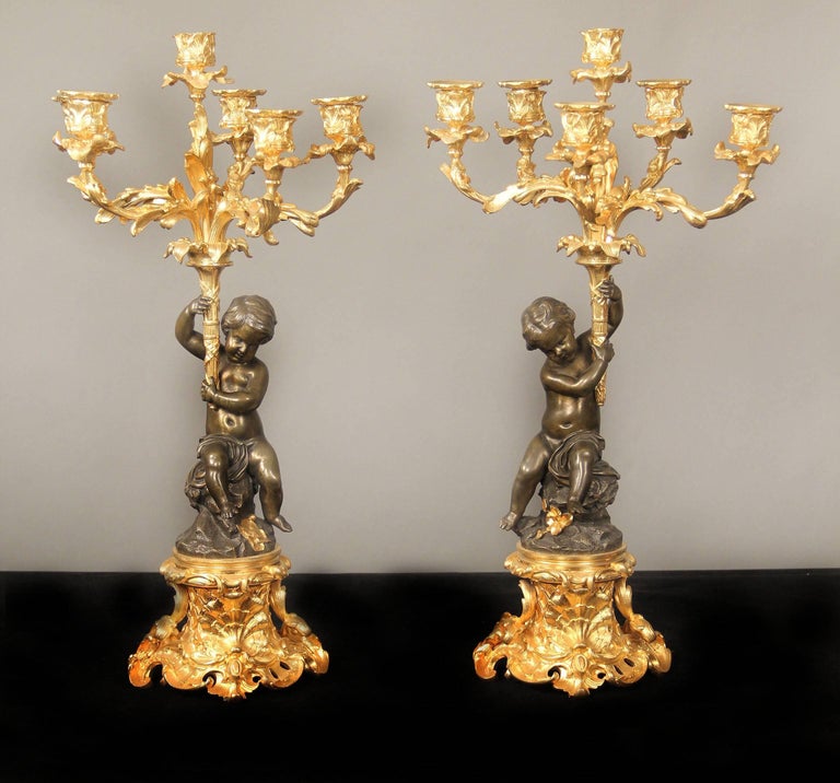French 19th Century Gilt and Patinated Bronze Three Piece Clock Set by Victor Pierret For Sale