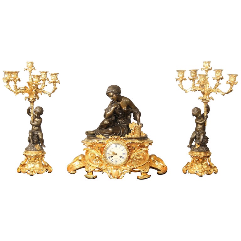 19th Century Gilt and Patinated Bronze Three Piece Clock Set by Victor Pierret For Sale