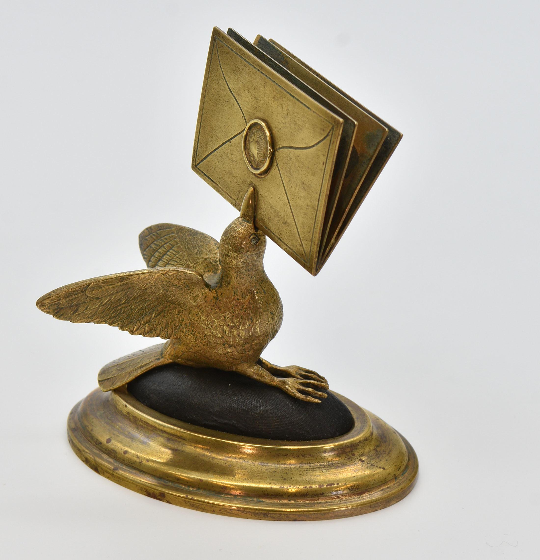 A 19th century gilt brass figural bird letter holder, standing on a stepped oval base. Circa 1870.

Sturdy with no damage.