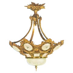Lustre de style Régence du XIXe siècle en bronze doré et cristal
