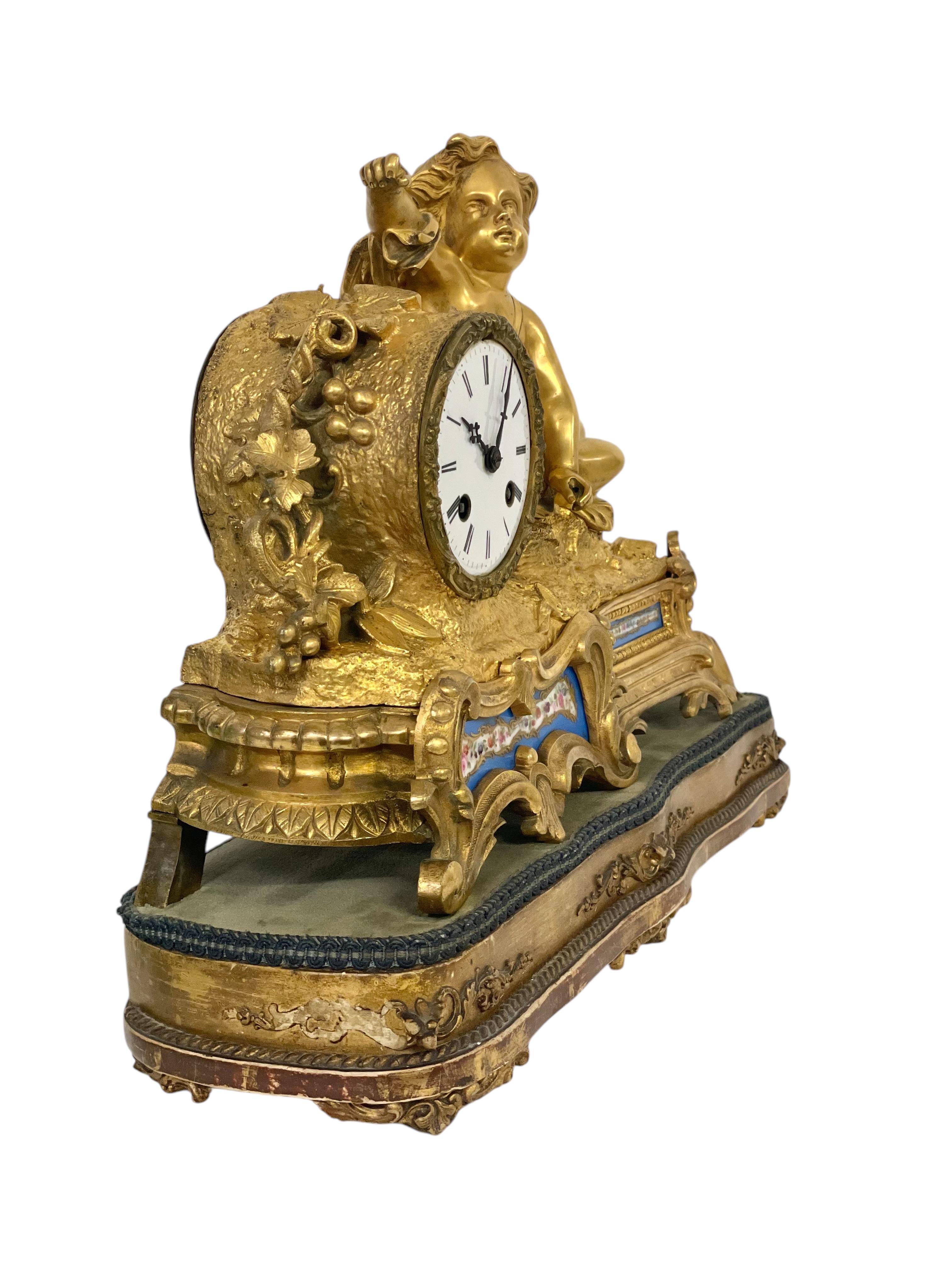 19th century Gilt Bronze and Porcelain Clock by 