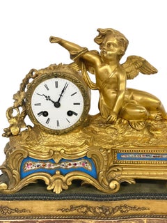 19th century Gilt Bronze and Porcelain Clock by "Miroy Frères"