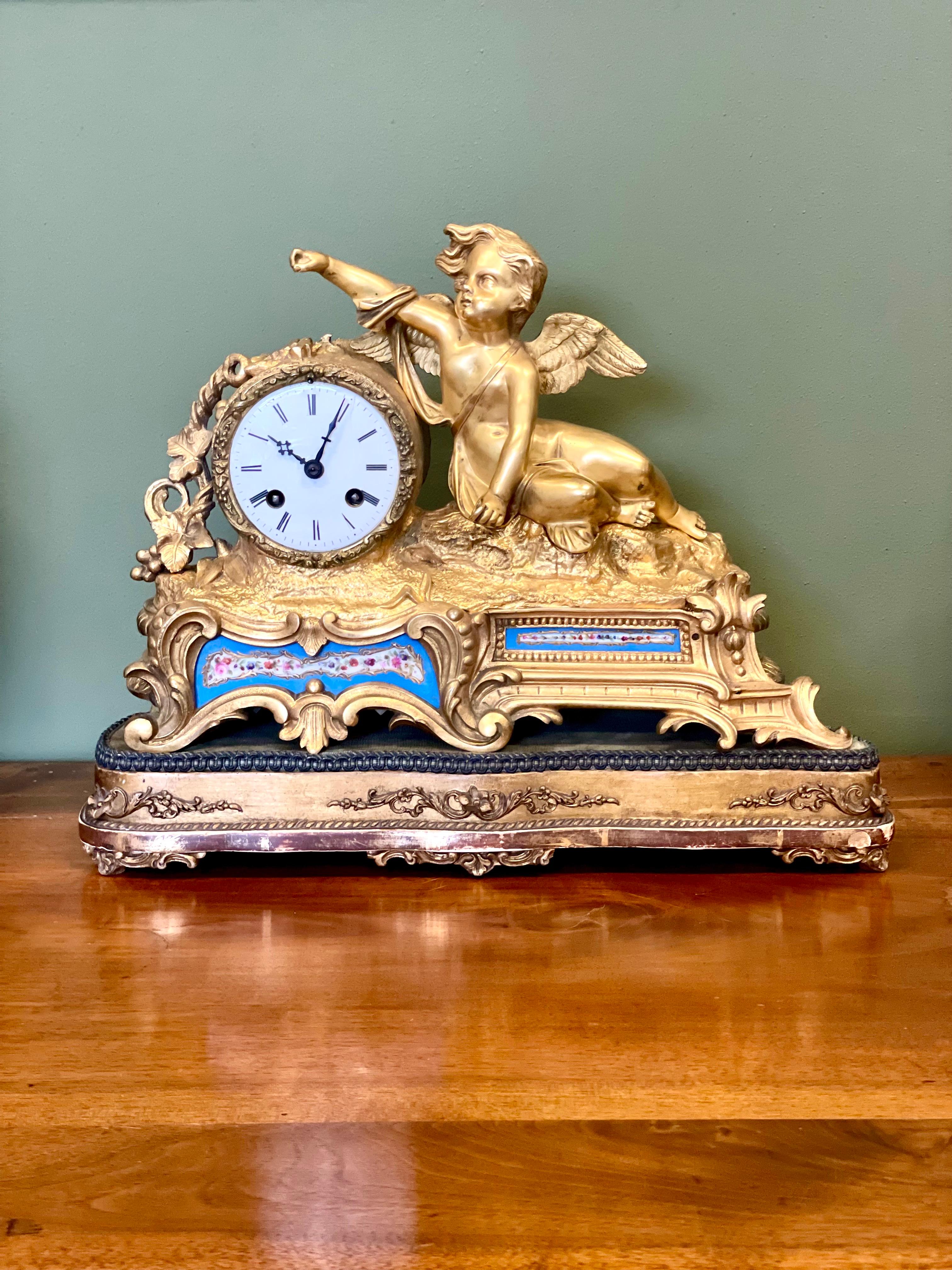19th century Gilt Bronze and Porcelain Clock by 