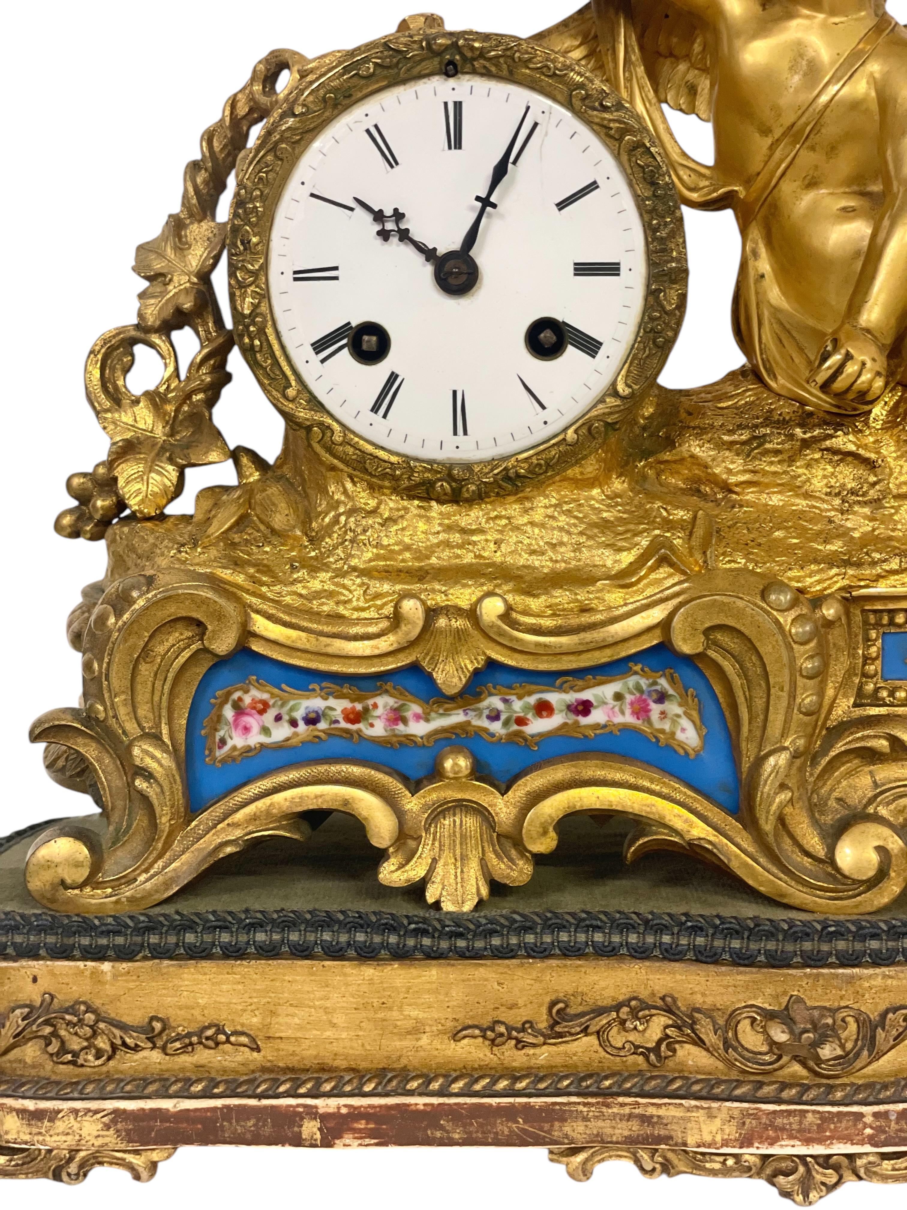 19th century Gilt Bronze and Porcelain Clock by 