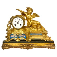 19th century Gilt Bronze and Porcelain Clock by "Miroy Frères"