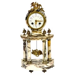 19th Century Gilt Bronze and Veined Marble Mantel Clock