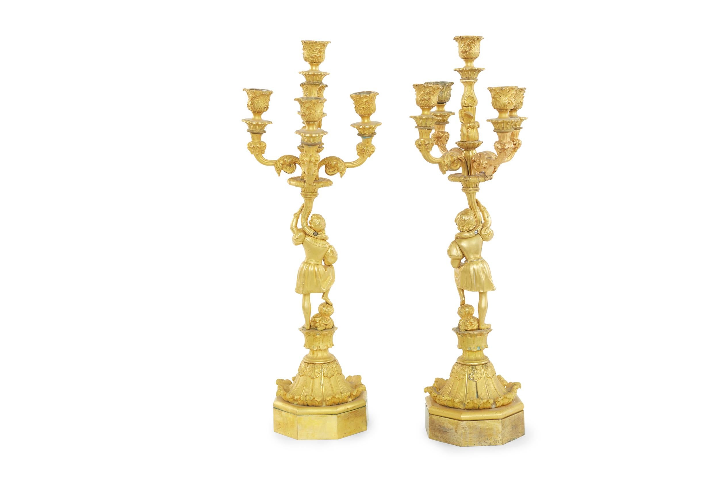 late 19th Century gilt bronze five lights tableware candelabras. The candelabras is in good antique condition. Minor wear appropriate with age / use. The candelabras measures about 20 7/8 inches high X 7 inches top diameter.