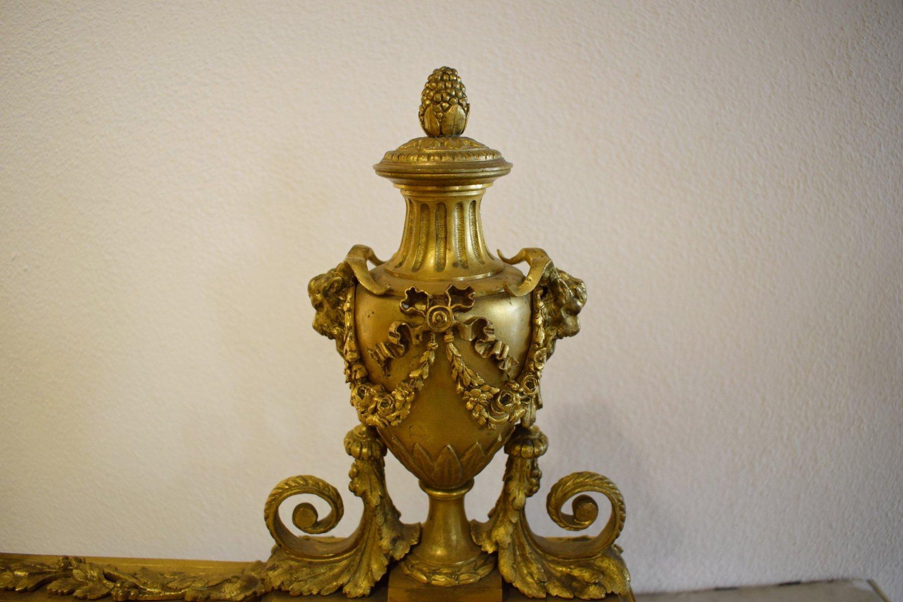 Bronze 19Th Century, Pair of French Louis XVI style gilt bronze Fireplace Chenets For Sale