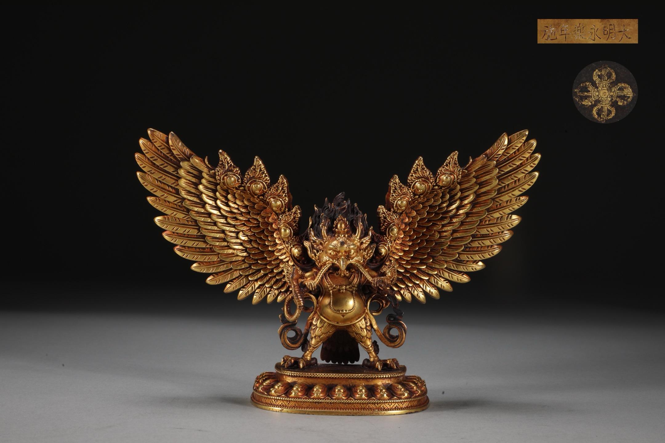 19th Century Gilt Bronze Garuda Buddha Statue – A Symbol of Power, Protection, and Wisdom

This 19th Century Gilt Bronze Garuda Buddha Statue is a rare and powerful representation of Garuda, the mythical bird deity revered in Buddhism and Hinduism
