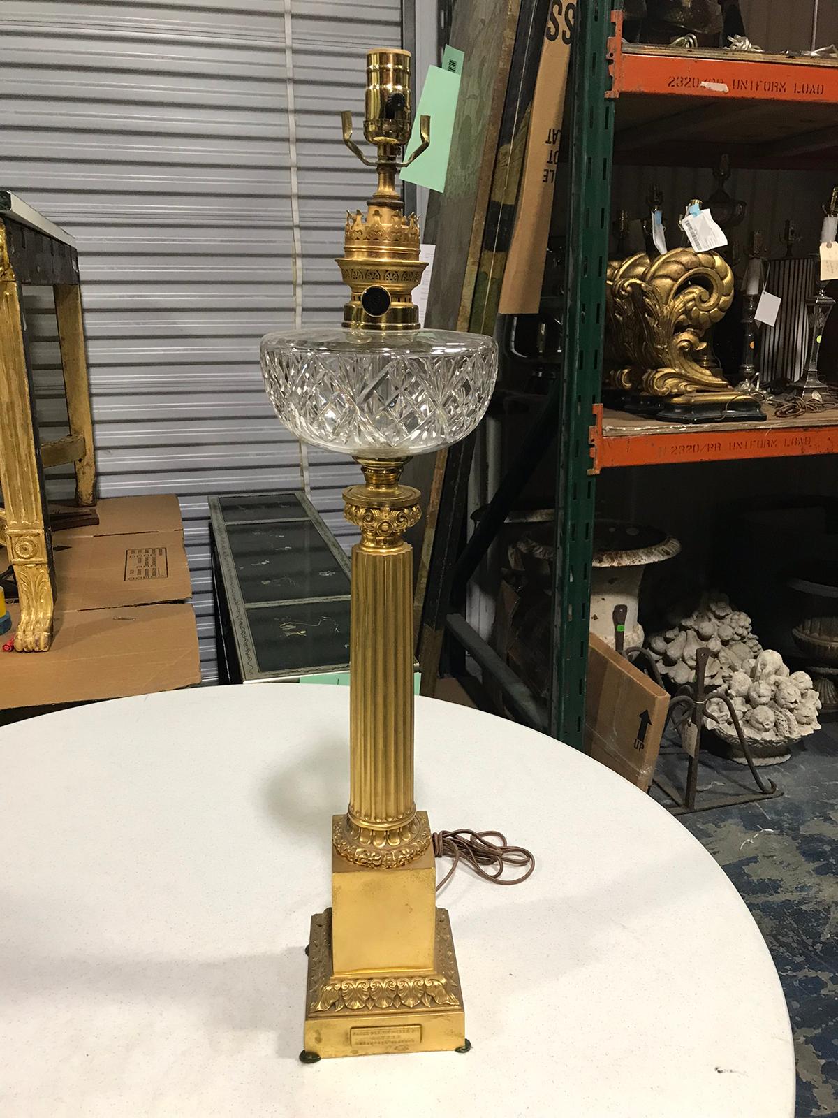 19th century gilt bronze lamp with crystal oil font
New wiring.
