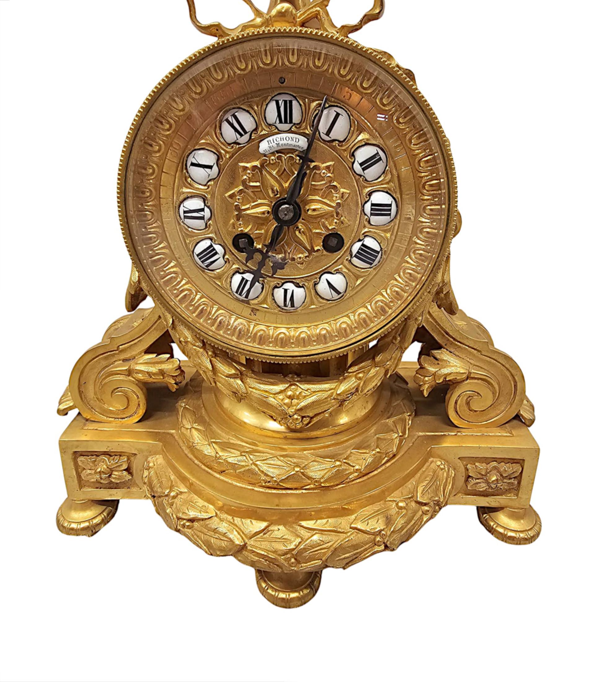 Francese Orologio da camino in bronzo dorato del XIX secolo di Richond of Paris in vendita