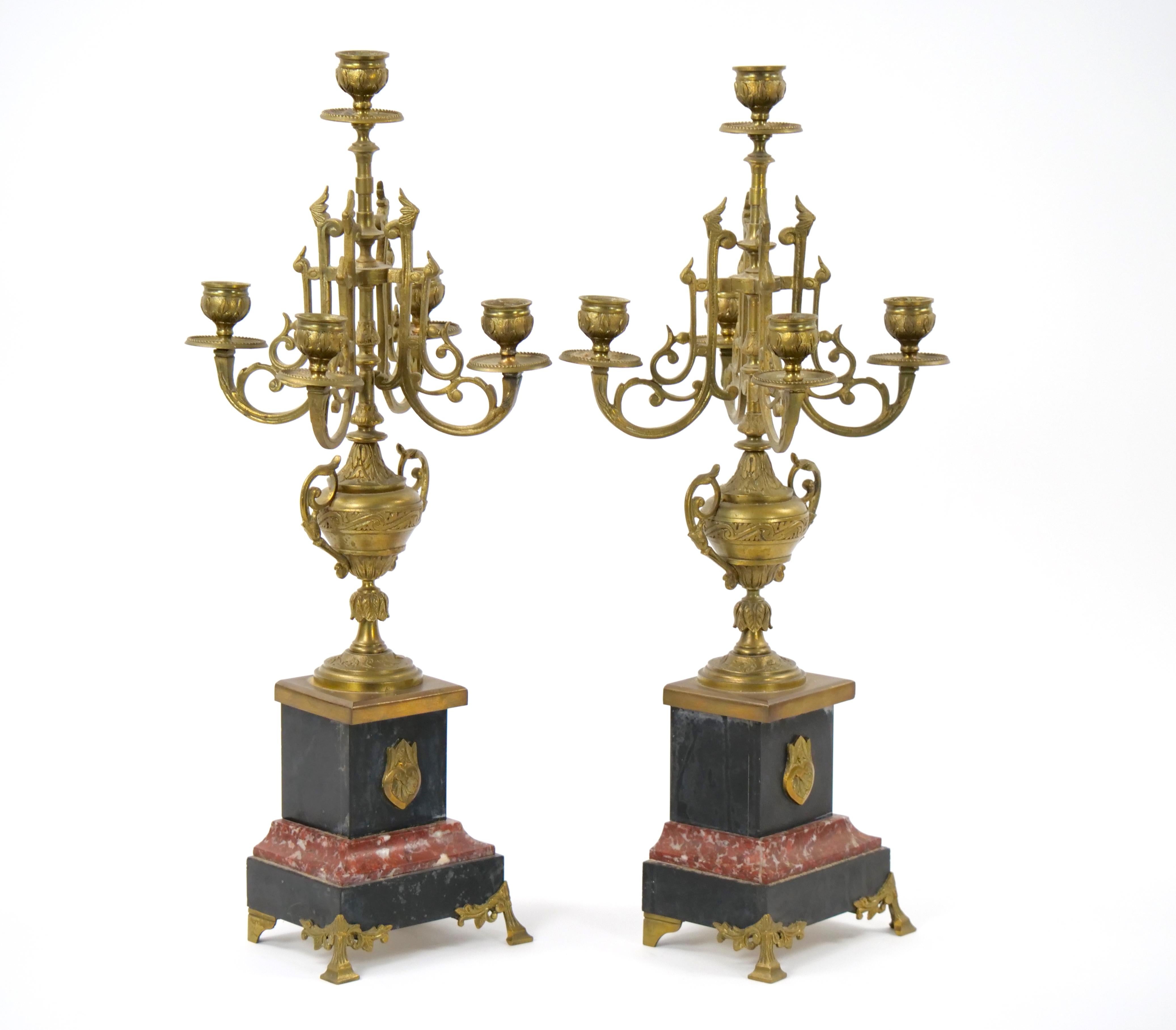 Step into the timeless elegance of the 19th century with this magnificent Gilt Bronze-Mounted Slate and Rouge Marble Five Arm Candelabra. Meticulously crafted, this candelabra is a fusion of artistry, opulence, and functional beauty. The harmonious