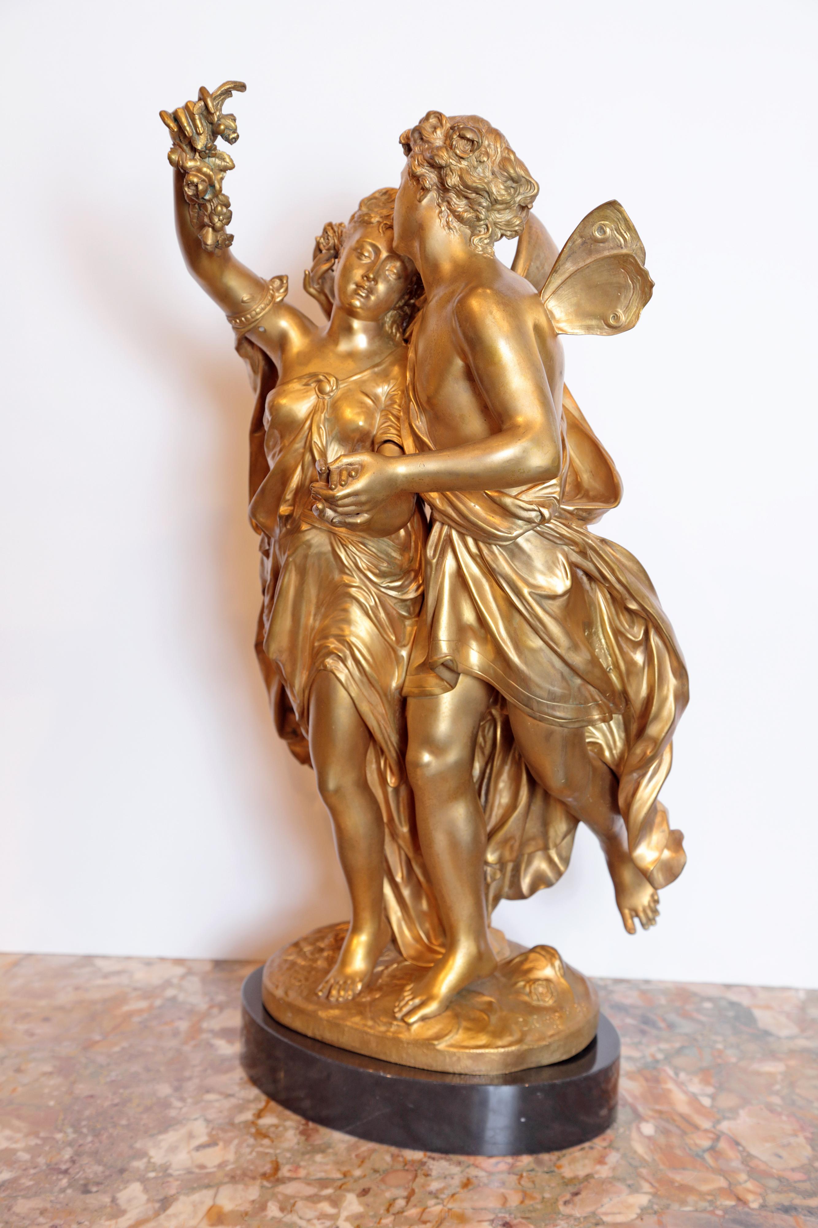 19th century large French gilt bronze figural statue on a marble base.