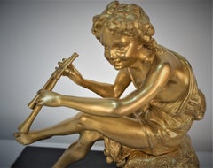 19th Century Gilt Bronze Sitting Boy Playing Flute