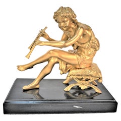 19th Century Gilt Bronze Sitting Boy Playing Flute 