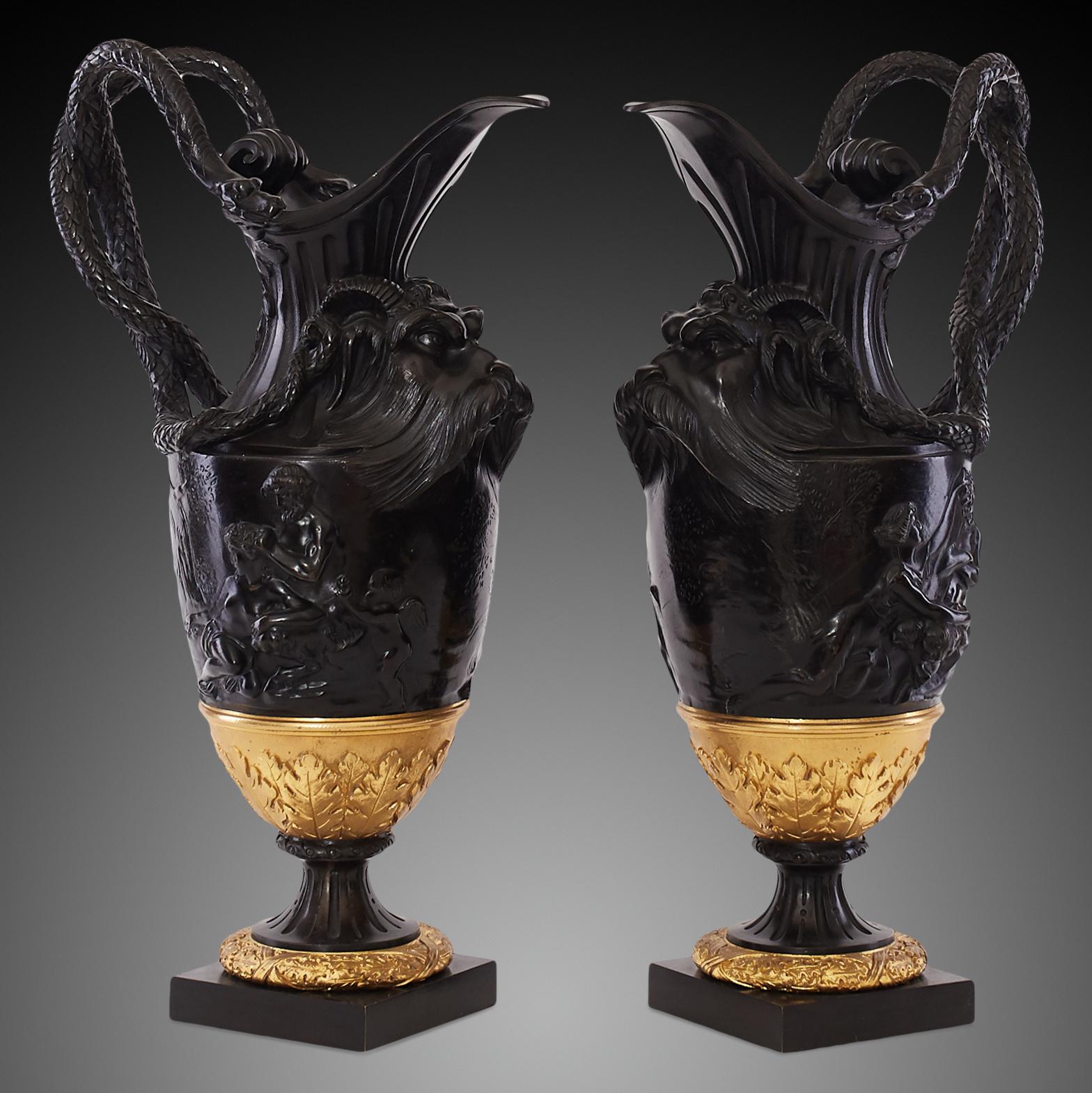 19th century gilt bronze two-piece Garniture after Claude Michel Clodion. Late 19th century gilt and patinated bronze two-piece garniture. After Claude Michel Clodion. Consisting of pair of urns with fluted spreading neck fronted with a grotesque