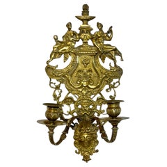 Applique in bronzo dorato del XIX secolo con figure allegoriche