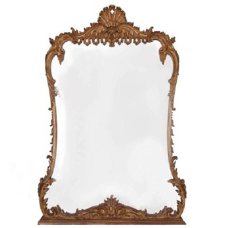 Miroir en bois sculpté et doré du 19ème siècle