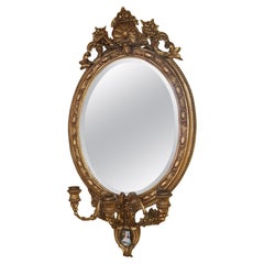 Specchio con cornice dorata del XIX secolo