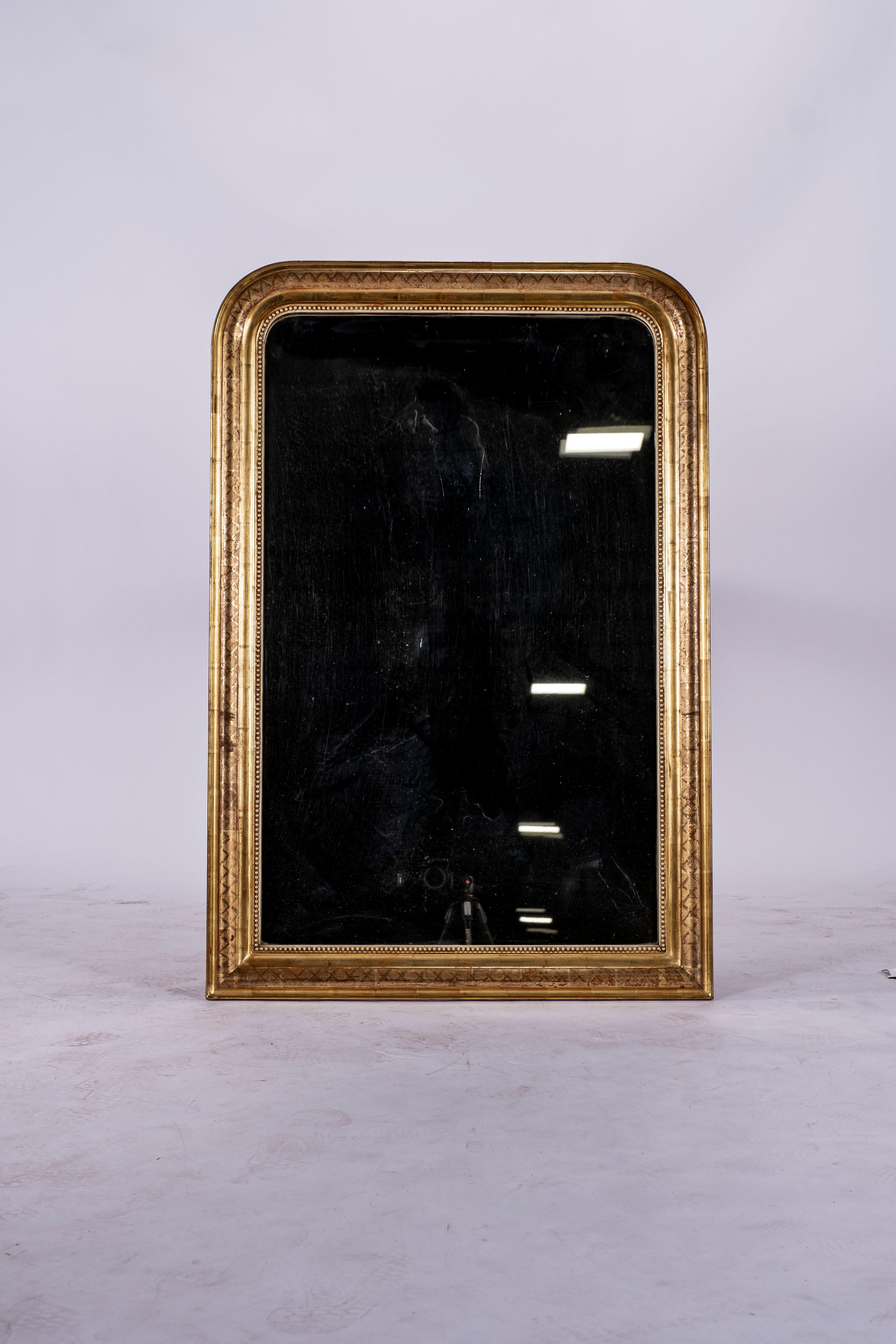 Gilt on red Louis Philippe mirror with cross hatch etching. Original glass, Circa 1880.