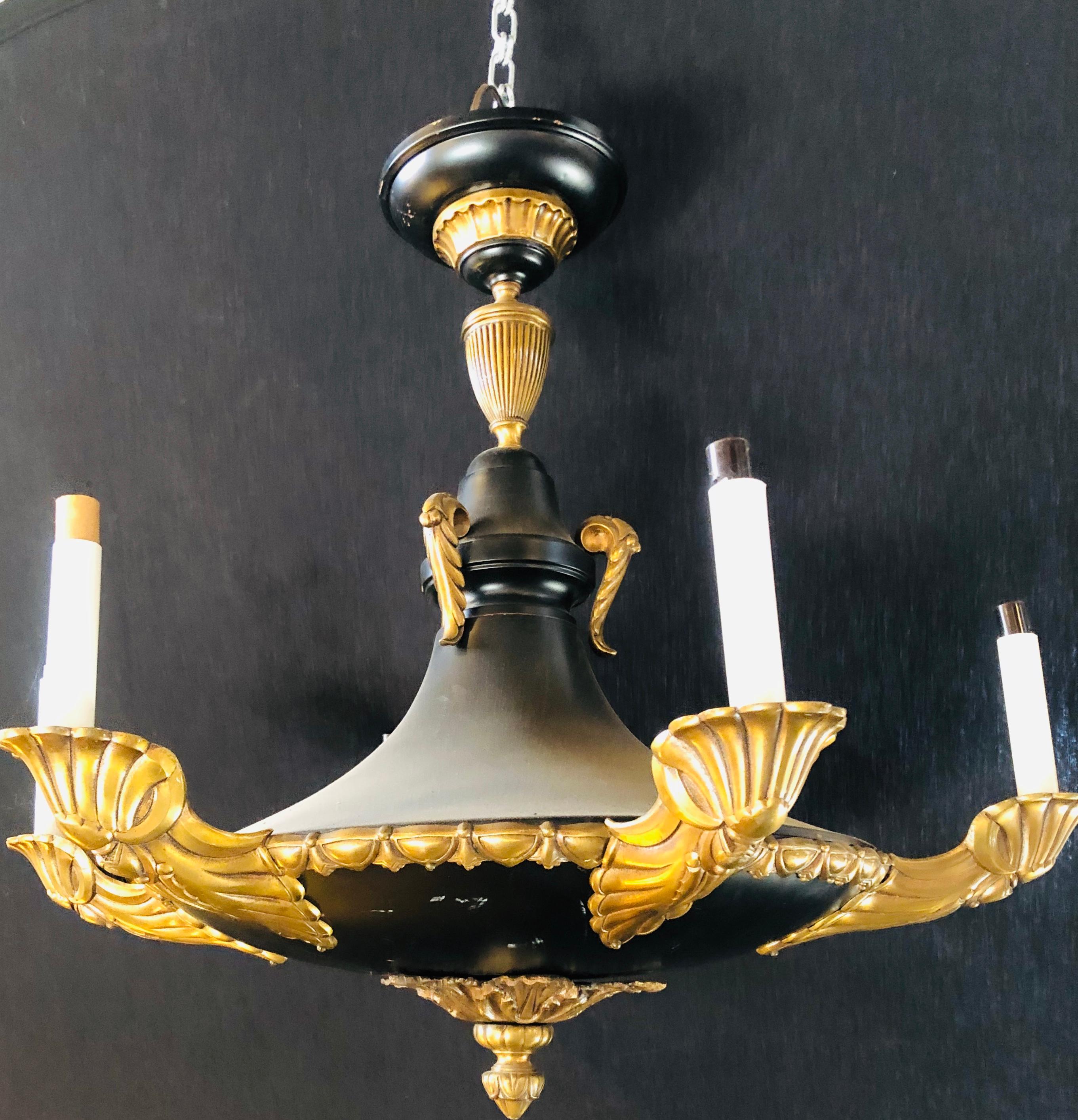 19th century gilt metal and ebony chandelier.

  