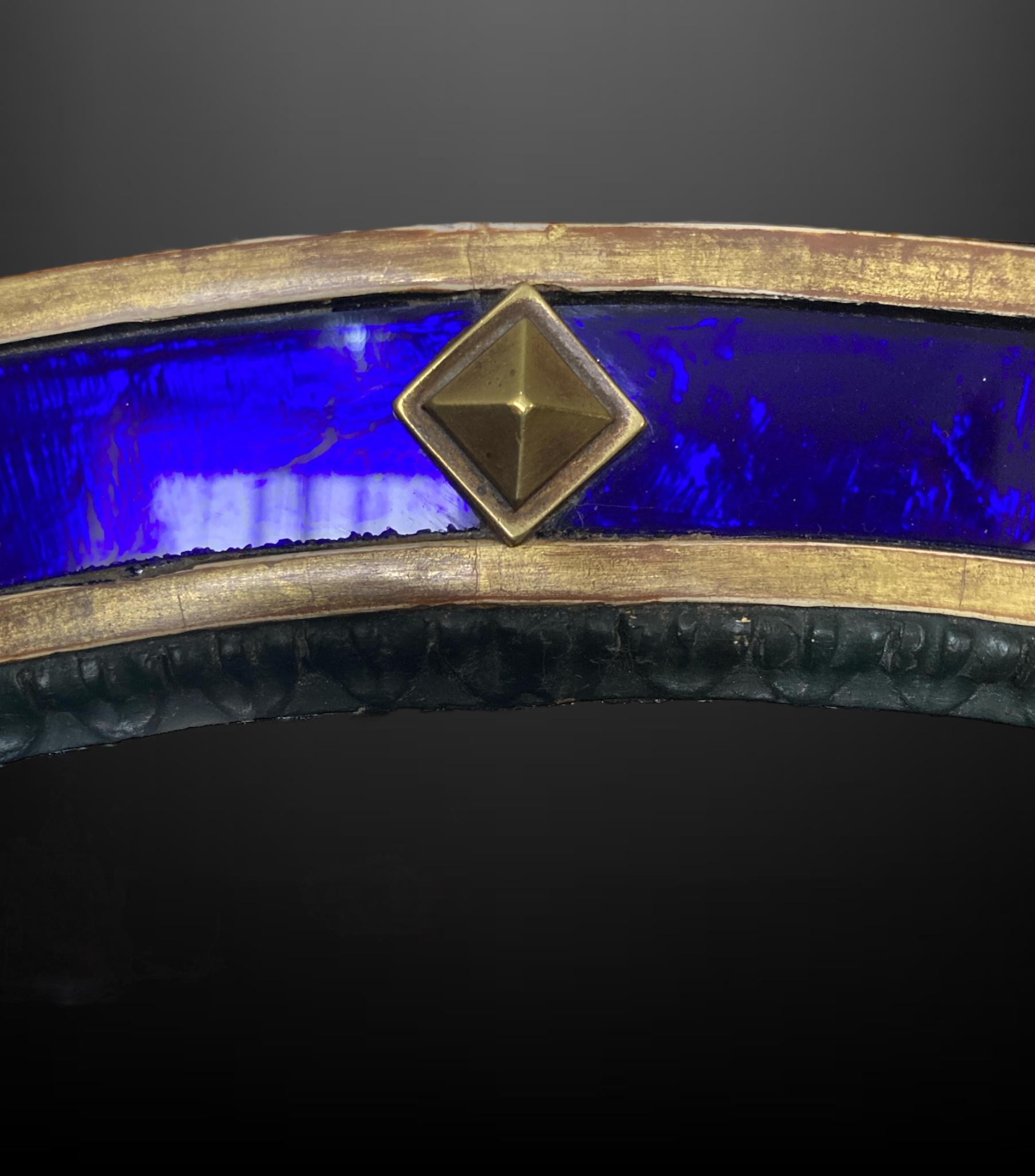 Regency 19th Century Giltwood and blue glass oval wall mirror
