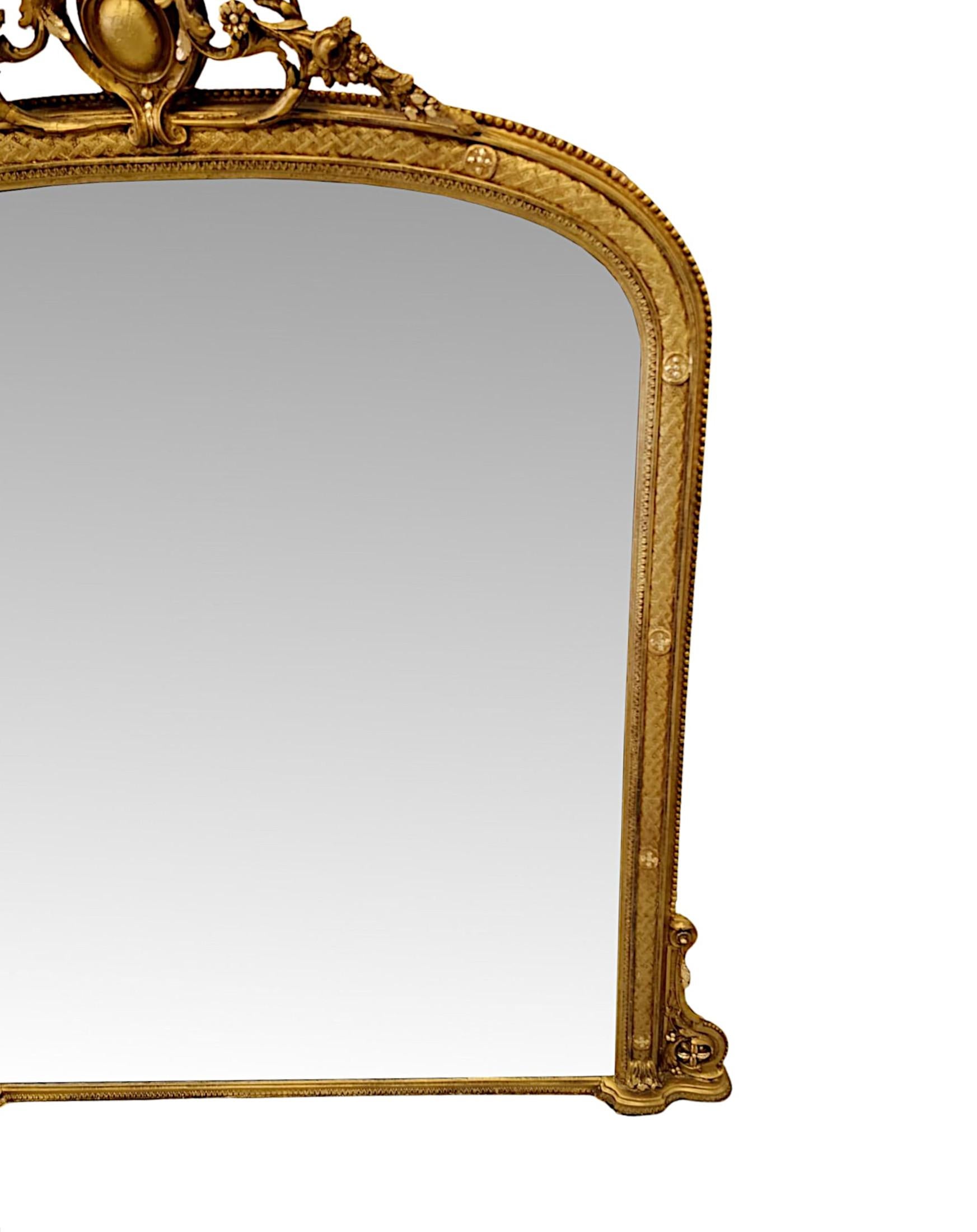English 19th Century Giltwood  Archtop Overmantel Mirror with Central Cartouche For Sale