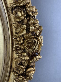 19th Century Giltwood Mirror with Floral Decoration