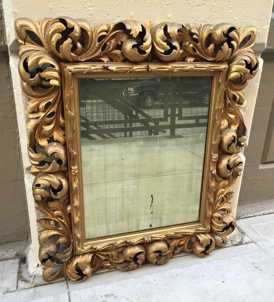 19th century giltwood Rococo style mirror. Original mirror.