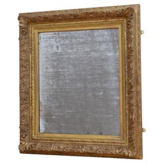 Miroir mural en bois doré du 19ème siècle Miroir doré
