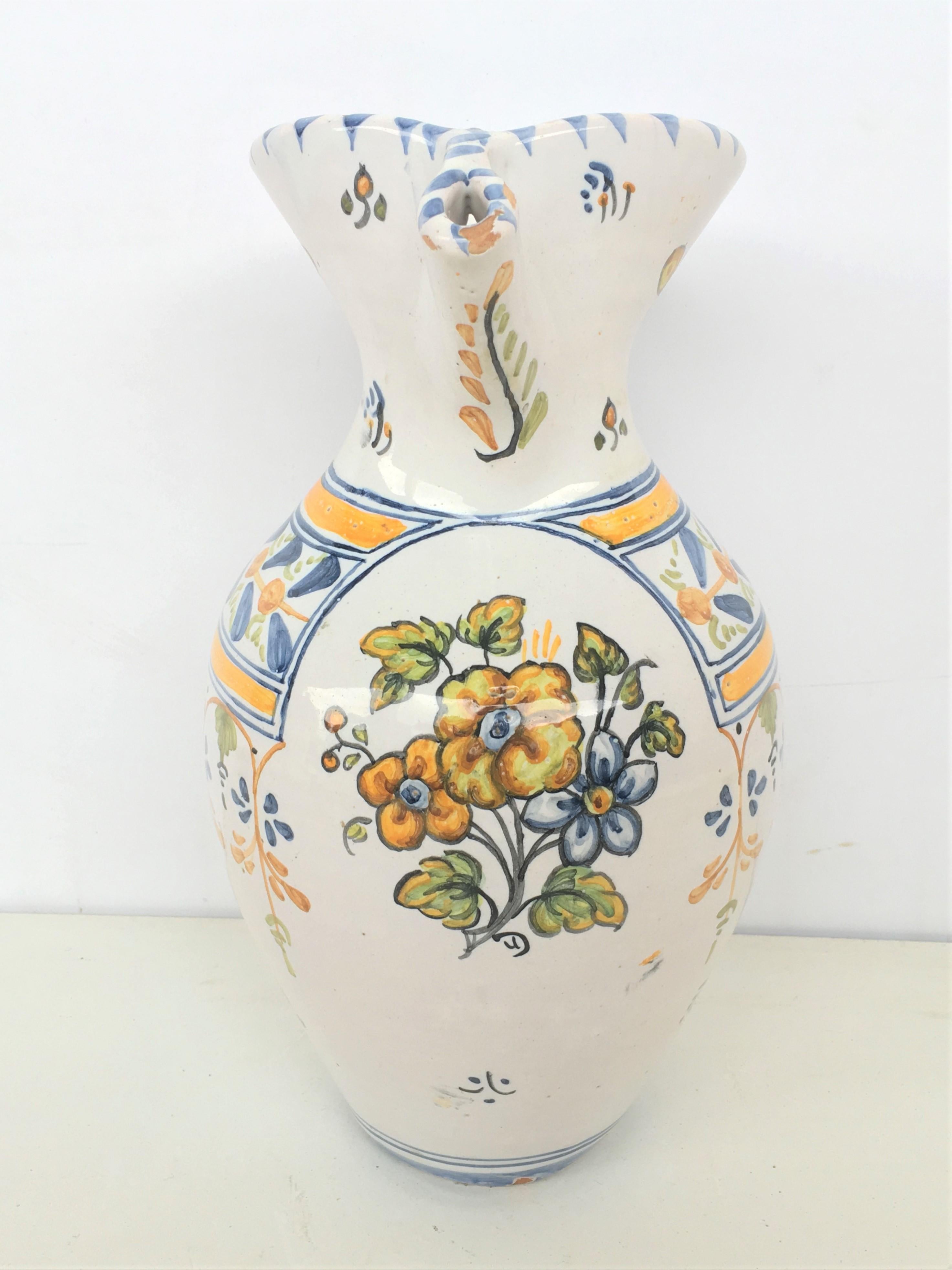 Spanish 19th Century Glazed Earthenware Talavera Floral Painted Pitcher For Sale