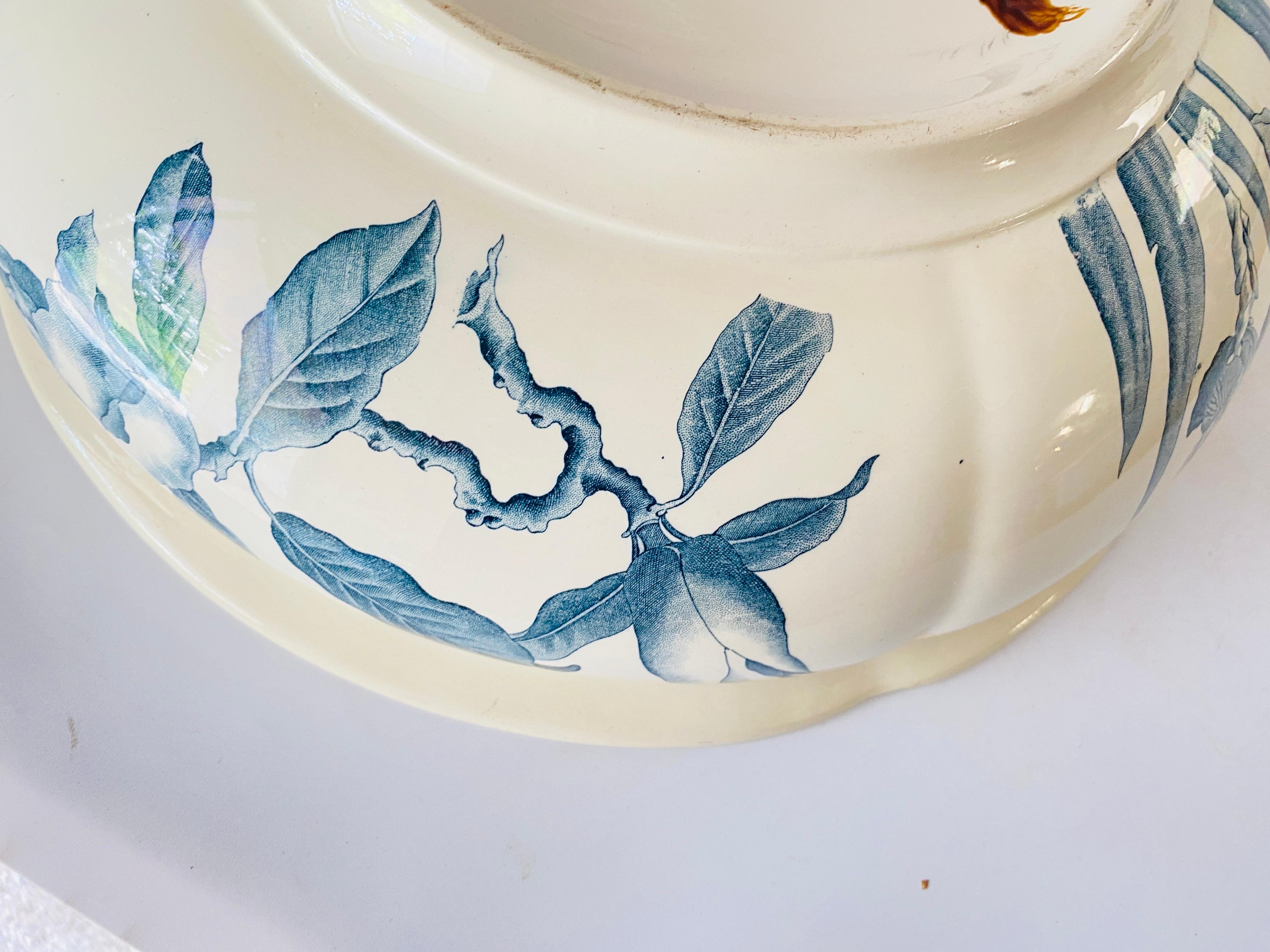 1880 circa glazed large ceramic basin by Magnolia B.F.K.
Internal profiling hand decorated in blue with decorative flowers, very fine Drawing.