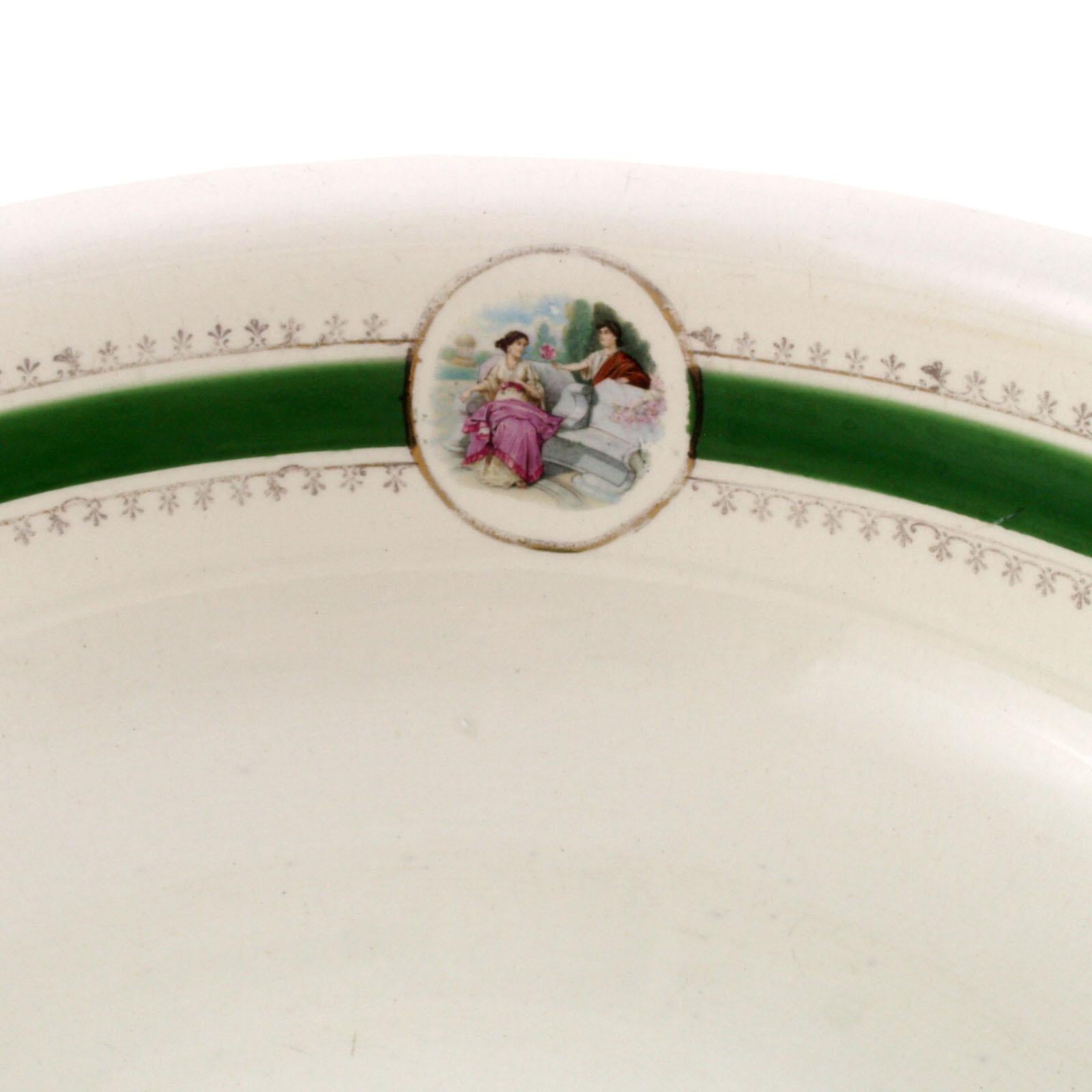 Italian 1880 circa glazed large ceramic basin by Societa Ceramiche Italiana di Laveno.
Internal profiling hand decorated in green with two decorative medallions depicting female figures of the time
The piece is intact and free from breakage,