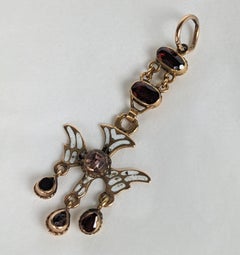 19th Century Gold and Garnet Saint Esprit Pendant
