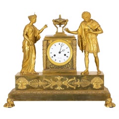 Horloge de table en bronze doré Empire français du 19e siècle - Pendule ancienne