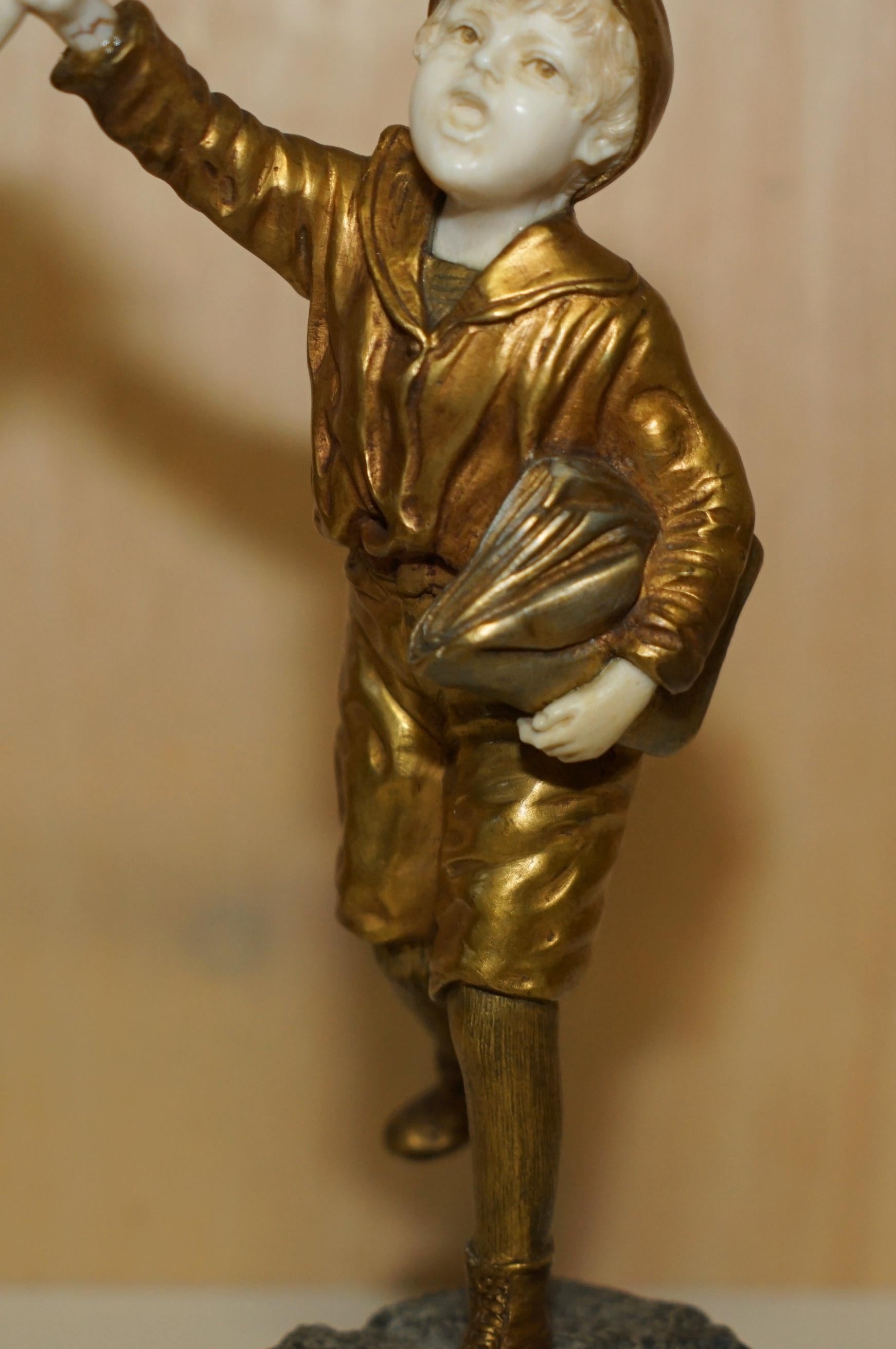 Gilt 19TH CENTURY GOLD GILT BRONZE DEMETRE H CHIPARUS SiGNED NEWSPAPER BOY STATUE For Sale