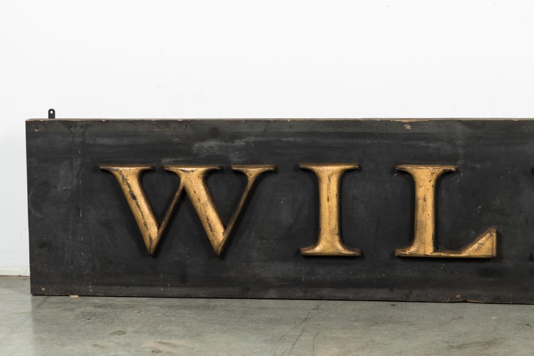 Classic 19th century American wood trade sign with chunky hand carved and gold painted letters. Ready to display.