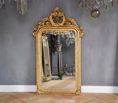 19th century gold leaf gilt French mirror Louis Philippe with a crest