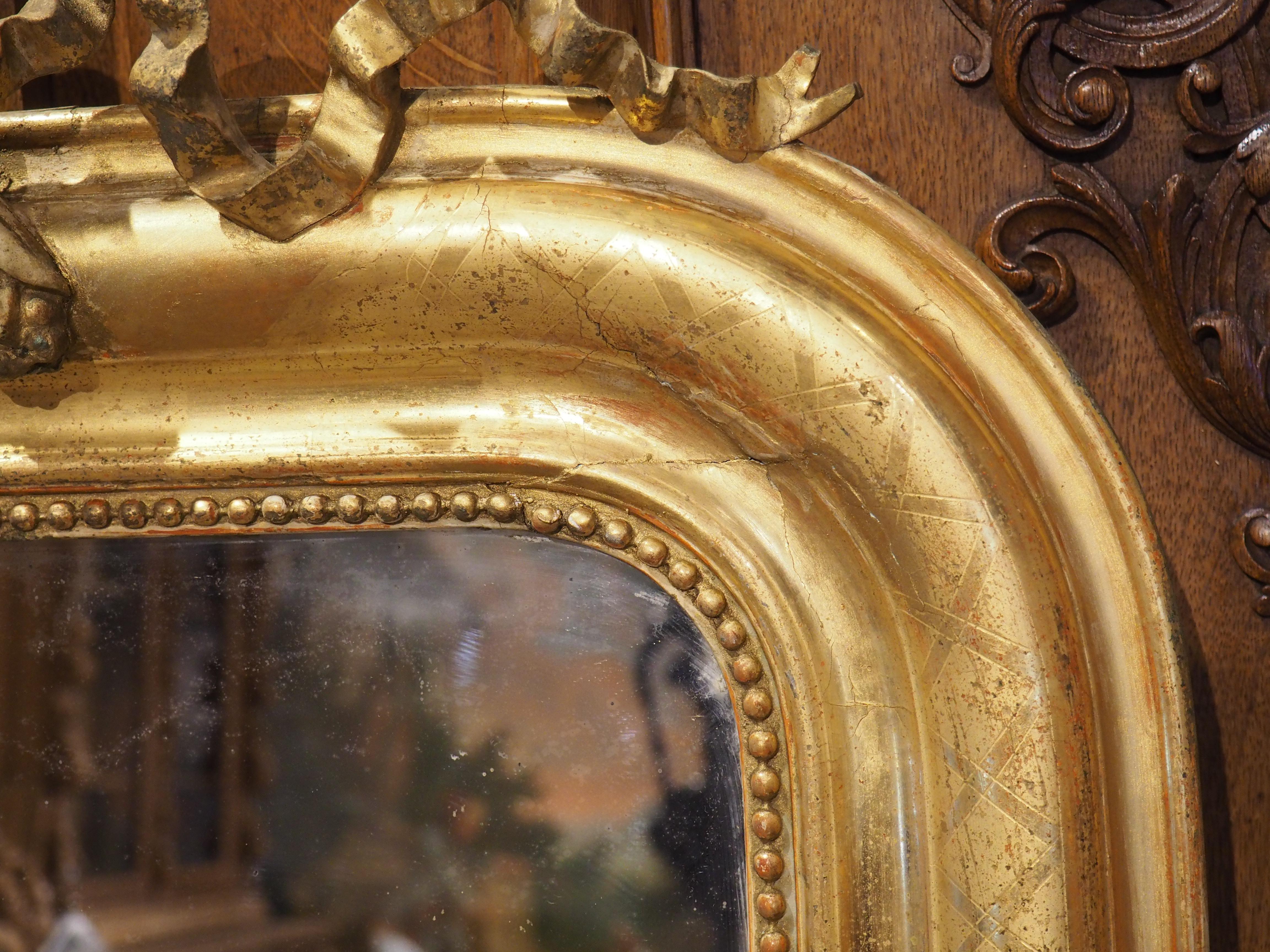 French 19th Century Gold Louis Philippe Mirror with Beading and Ribboned Cartouche